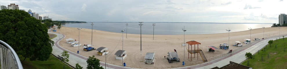 Panorama view of Ponta Negra beach in Manaus Amazon Brazil, in the afternoon with light cloudy...