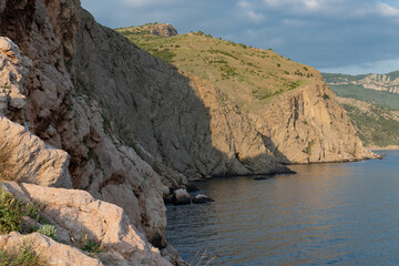 Fototapeta na wymiar Rock in the sea bay. Sea bay rock view. Landscape of sea bay 