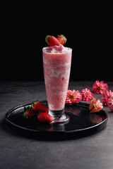 Strawberry smoothhie on black background - 445432043