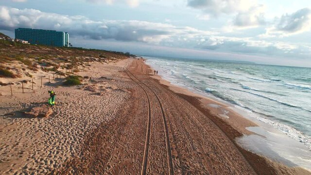 Aerial panoramic view of empty sandy beach of La Mata in the early morning. First person view motion. Costa Blanca. Province of Alicante. Torrevieja. Spain. Travel concept