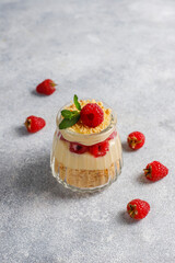 Homemade raspberry trifles on a light background.