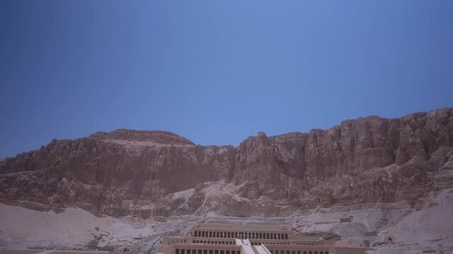 temple of Hatschepsut in Egypt near Luxor. Establishing Shot of ethe Main entrance and the surroundings.