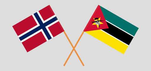 Crossed flags of Norway and Mozambique. Official colors. Correct proportion
