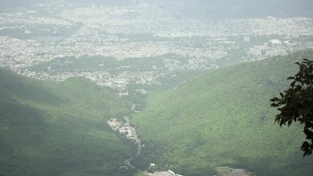 Aerial View of Junagadh city with green hills from top of Girnar mountain in monsoon season 