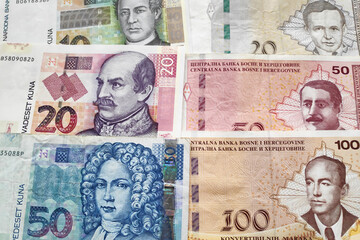 Close-up on a stack of Croatian Kuna and Bosnia and Herzegovina convertible mark.