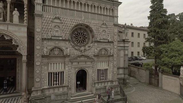 Aerial drone footage view of Bergamo, historical buildings and towers  of Old city, in Italy // no video editing
