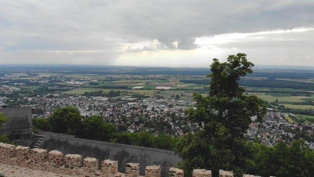 Drone flight over castle Auberbach in Germany with a beautiful panorama of forests and mountains.