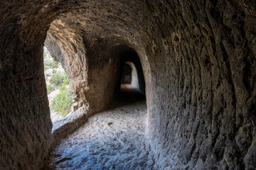 Passages and tunnels excavated in the rock by the ancient Romans, to build the aqueduct of Chelva, Valencia (Spain).