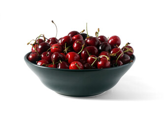 bowl with ripe fresh cherries isolated on white background