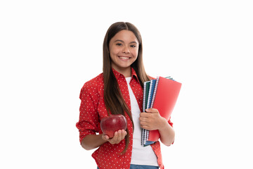 happy teen girl hold school copybook for studying and apple lunch isolated on white, healthy lunch