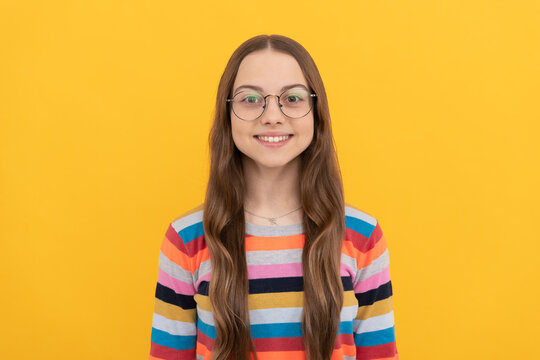 happy teen girl look through eyeglasses. vision acuity. eyesight. vision correction