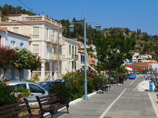June 2021, Poros, Greece. A seaside street with traditional houses, in the island’s town