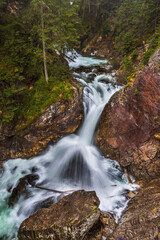 Fototapeta na wymiar View of the Waterfalls of Mickiewicz, the High Tatras on Roztoka stream. Poland.