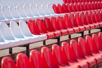 Plastic seats on the stadium field.