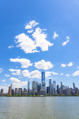 Unique shape clouds float over the Lower Manhattan skyscraper in springtime at New York City NY USA on May 14 2021. Image was taken from Jersey City NJ.