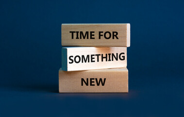 Time for something new symbol. Wooden blocks with words 'Time for something new' on beautiful grey...