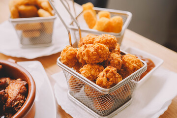 Ration of balls stuffed with cheese and chicken