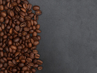a lot of coffee beans on a black background