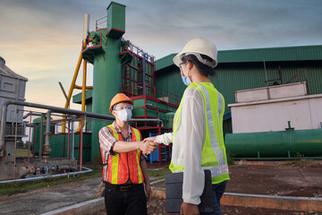 Construction engineers supervising progress of construction proj