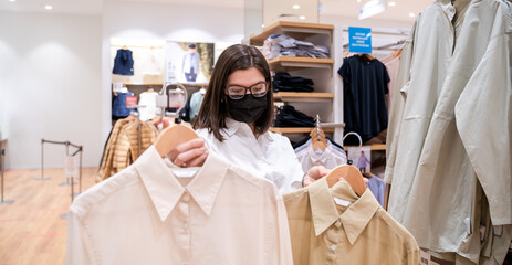 Personal private shopping tour with stylist.Professional individual assistance for client,shopper,woman in store.Choosing,buying stylish fashion clothes for trendy look.Sale in mall,boutique,showroom