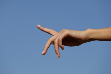hand on the sky background