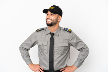 Young arab man isolated on white background posing with arms at hip and smiling