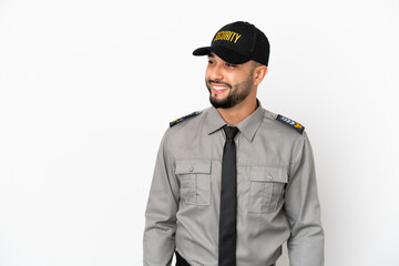 Young arab man isolated on white background looking to the side and smiling