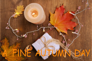 beverage,leaves, foliage, garland, candles, top view of wooden table, good weather concept, outdoor...