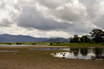 Bassenthwaite Lake surrounded by hills on a cloudy summer afternoon, Lake district, England