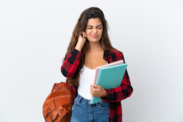 Young student woman isolated on white background frustrated and covering ears