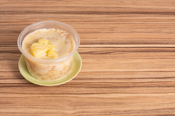 pineapple pot cake on wooden background