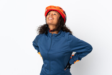 Teenager cyclist woman isolated on white background posing with arms at hip and smiling