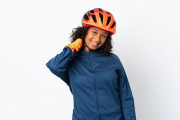 Teenager cyclist woman isolated on white background laughing - obrazy, fototapety, plakaty