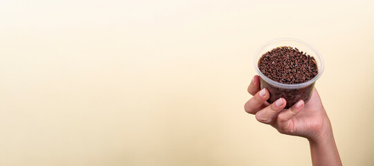 cake in brigadeiro pot on yellow background