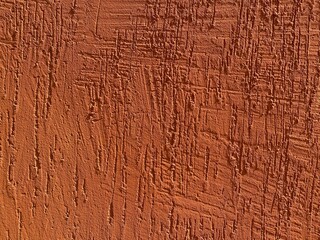 orange rough plaster wall background texture