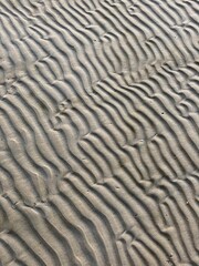 wavy sea sand texture background closeup