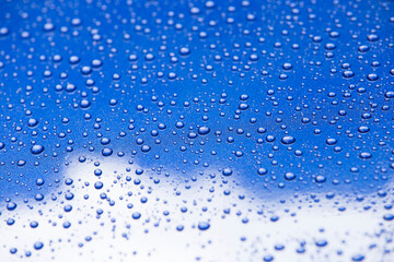 Naklejka na ściany i meble close up of blue water drops