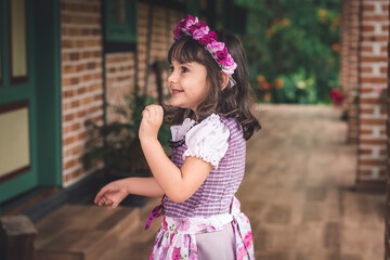 girl dressed in German in the garden