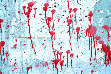 Red blood on the wall. Dirty concrete wall.