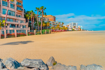 High rise hotels and residences line the sandy beach front of Long Beach, California