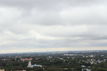 Naklejka premium clouds over the city