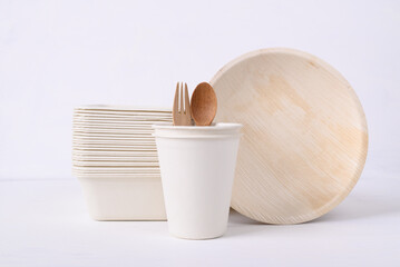Fototapeta na wymiar Biodegradable coffee cup, bowl and plate made from natural fiber on white background, Eco friendly and sustainability concept