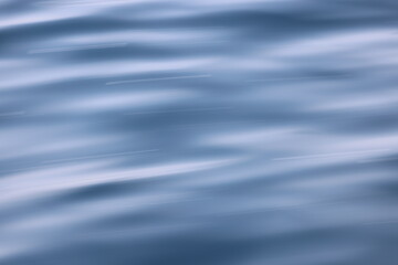 ripples in water, blue water surface