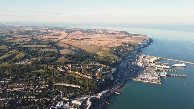 An aerial view of the historical harbor town of Folkestone Between Hythe and Dover, England in 4K
