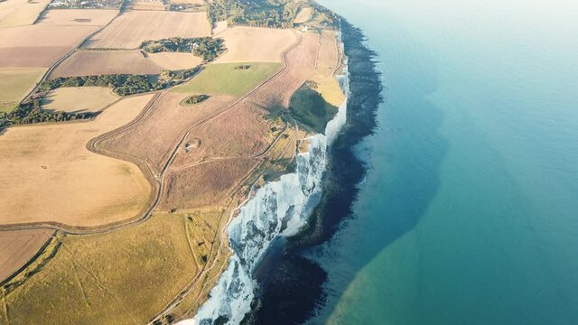 An aerial view of the historical harbor town of Folkestone Between Hythe and Dover, England  in 4K