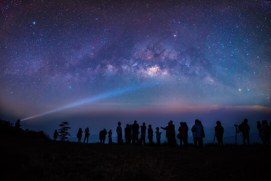 Travel With Milky Way Galaxy Mountain Before Sunrise On The Mountain Viewed From A High Angle. Image Exposure With Long Grain.Image Contain Some Grain Or Noise, And Soft Focus.
