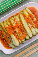 Fermented cucumbers with carrots and spices.