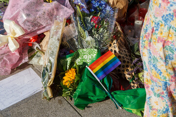 Friends assemble the altar in the street in homage to Samuel Luiz