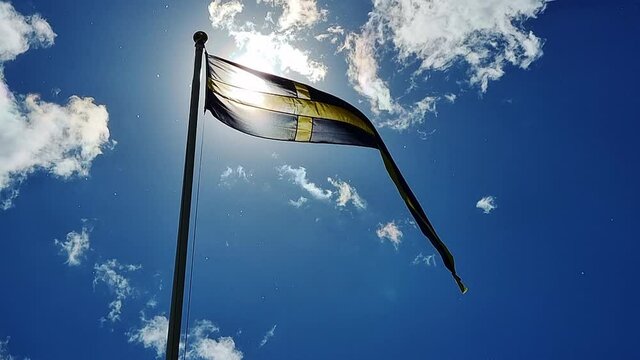 Waving Swedish flag in the wind