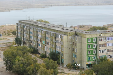 Zhezkazgan, Kazakhtan - 10.10.2016 : Residential buildings, commercial buildings and courtyards...